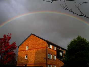 Complete arc rainbow in the sky near my house