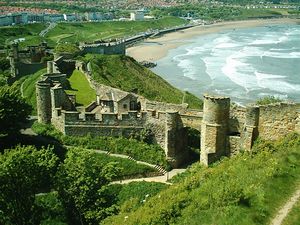 Scarborough Castle: Photograph of the barbican and entrance causeway taken from the curtain wall